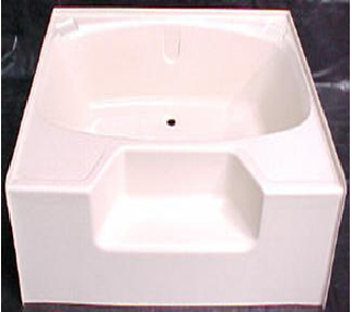Fiberglass dog grooming tub shell and bathing station example.
