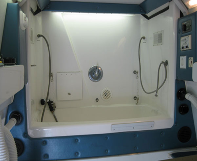 Fiberglass grooming tub example for a professional dog grooming bathing station.