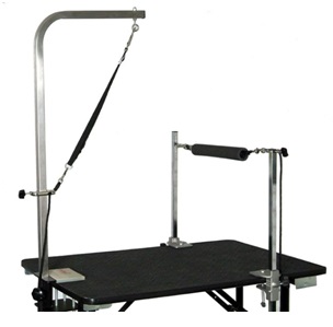 Groomers Helper clamp system attached to a standard grooming arm for dog grooming restraint.