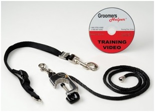 Groomers Helper restraint connection showing head-control positioning from the lower area of the grooming arm.