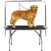 Grooming harness dog restraint with two loops attached to one clasp for grooming table use.